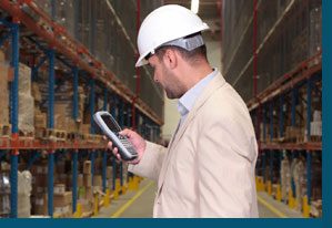 employee auditing warehouse inventory